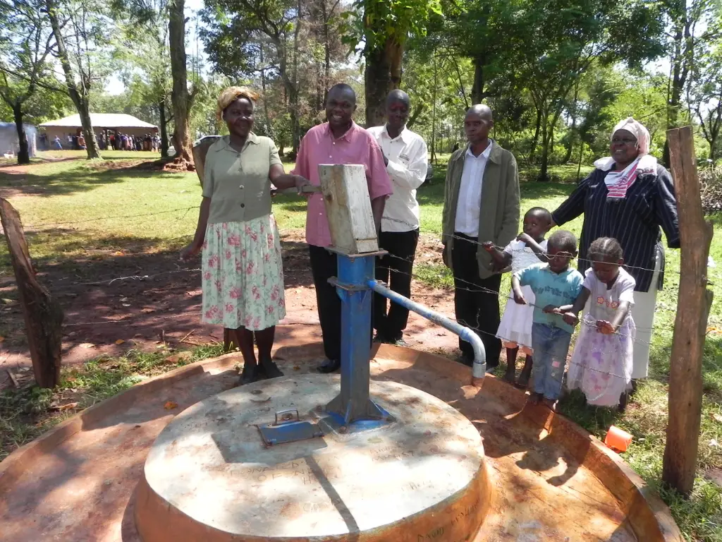 A community around a water pump in Kenya